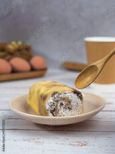 The crepe rolls have a lot of cream and look delicious.