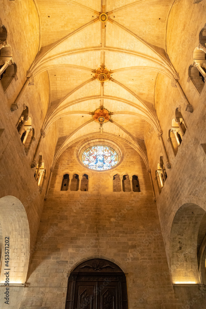 Fototapeta premium Girona medieval city, roofs and columns of the interior of the Basilica of San Felix, Costa Brava of Catalonia in the Mediterranean. Spain