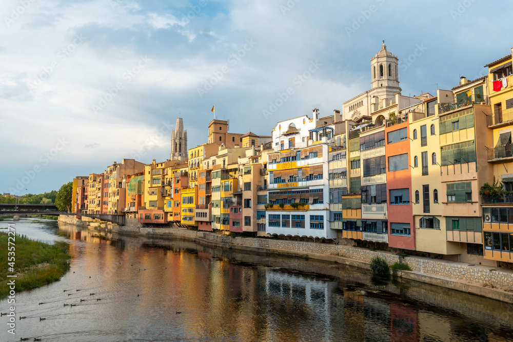 Girona medieval city, panoramic from the famous red bridge Pont de les Peixateries Velles, Costa Brava of Catalonia