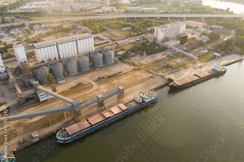 Loading ships with wheat grain for export in the port. Aerial view 