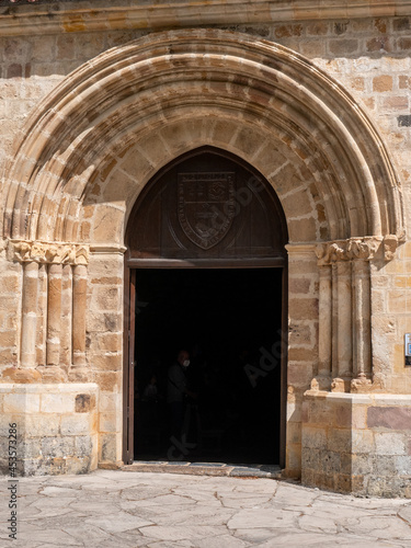 Vertical shot of a monastery entrance door of Santo Toribio de Liebana in Spain photo