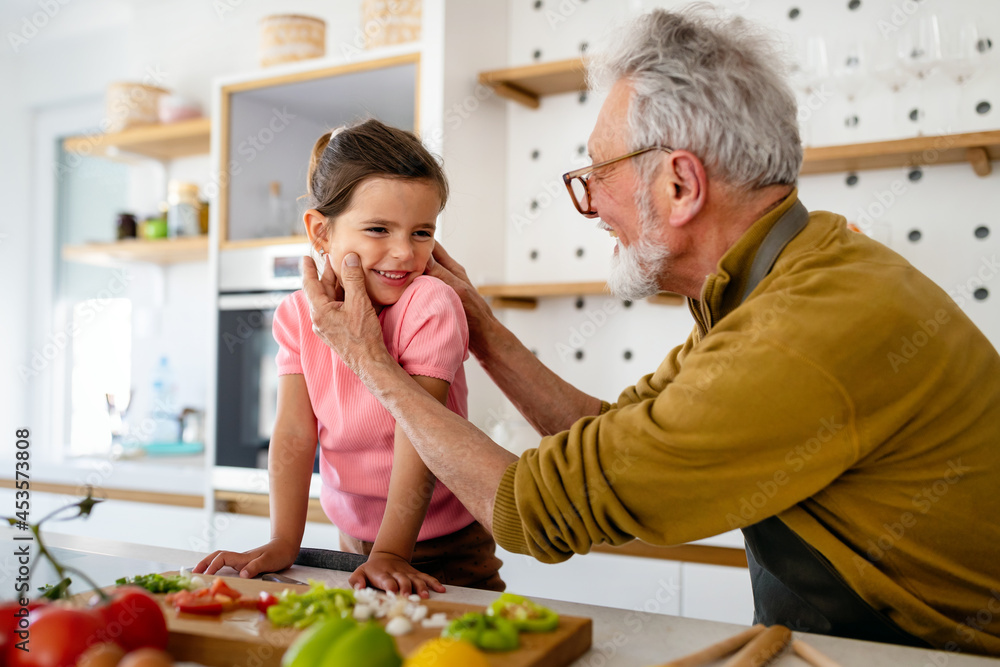 Happy grandparent having fun times with kid at home Happy grandparent having fun times with kid at home