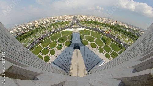 Tehran, Iran - April 2019: View from observation deck of Azadi Tower, Freedom Tower. Azadi Square and Tehran city skyline is visible in the 360 degrees wide shot video photo