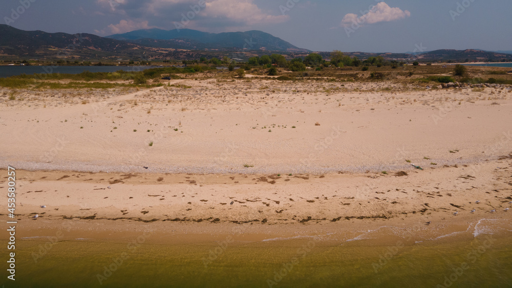 Panoramic drone clip of a small tropical peninsula in Strimonas, Macedonia, North Greece Panoramic drone clip of a small tropical peninsula in Strimonas, Macedonia, North Greece