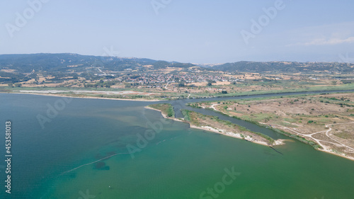 Panoramic drone clip of a small tropical peninsula in Strimonas, Macedonia, North Greece