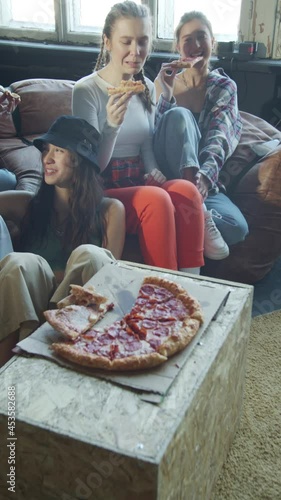 Group of teenagers get pizza after a long dance practice
