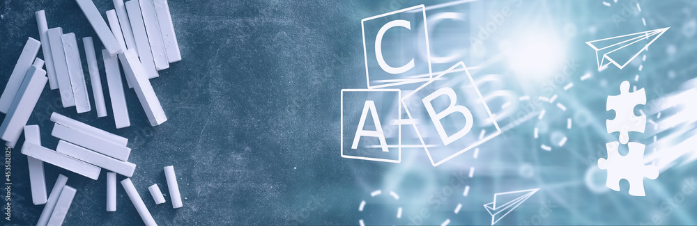 Chalkboard. Crayons for writing on a blackboard. Learning concept. School teaching chalk board.