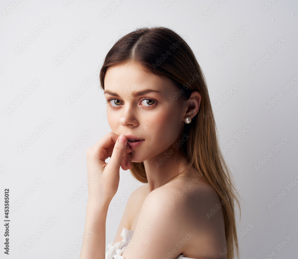 beautiful woman decorations posing light background beautiful woman decorations posing light background