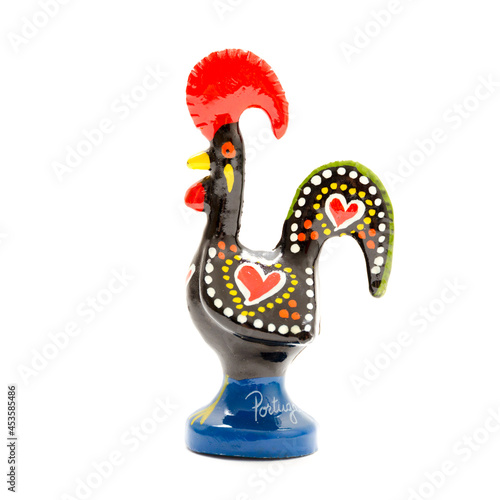 Rooster of Barcelos souvenire on white background, studio photo photo