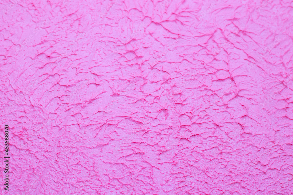 Pink background texture of putty . Decorative wall decoration. Pink wall. Texture with your own hands. Pink background texture of putty . Decorative wall decoration. Pink wall. Texture with your own hands.
