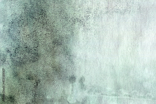 Grey green blue watercolor texture on rough paper
