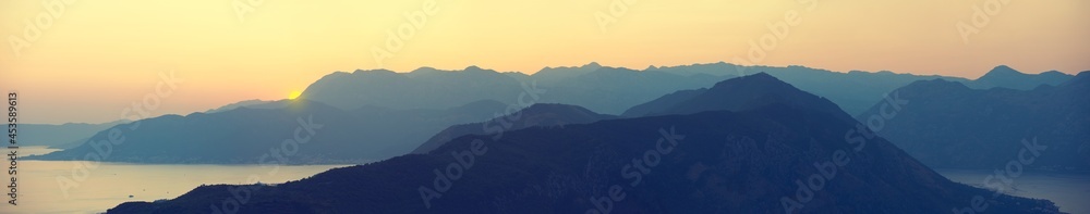 Panorama of a picturesque sunset in the mountains of Montenegro, high resolution Panorama of a picturesque sunset in the mountains of Montenegro, high resolution