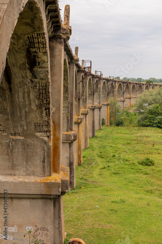 Mokrinsky railway bridge is a historical reinforced concrete arched viaduct, a railway crossing over the Utka river, located in the village of Mokry, Kanashsky district of the Chuvash Republic. Summer photo