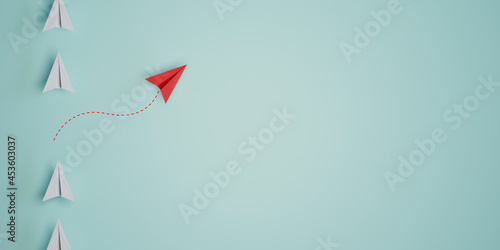 Red paper plane out of line with white paper to change disrupt and finding new normal way on blue background. Lift and business creativity new idea to discovery innovation technology. 3d render photo