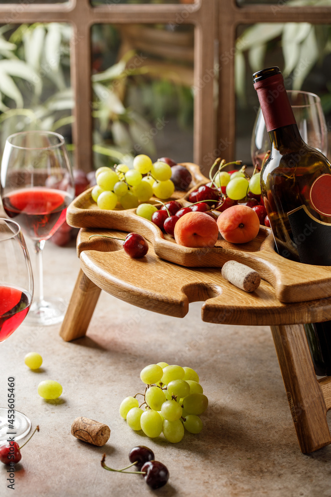 Wine table with grape and wine. Oak wine table Wine table with grape and wine. Oak wine table