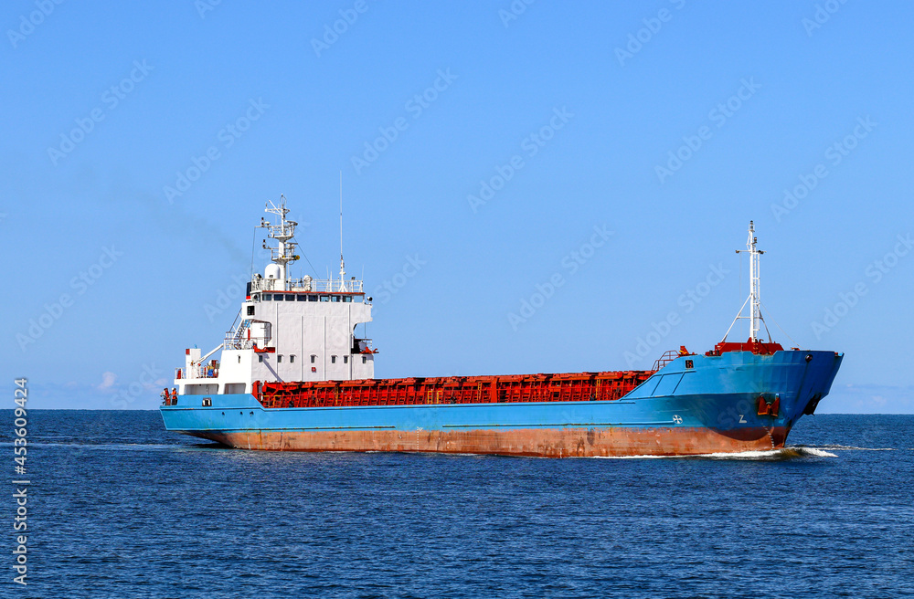 Large General Cargo ship on the high seas, close up 