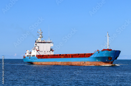 Large General Cargo ship on the high seas  close up 