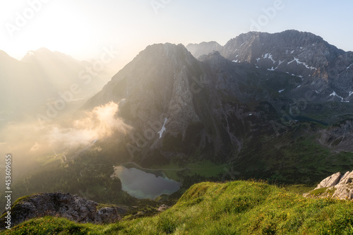 Lake seebensee from Mountain sonnenspitze in the morning at sunrise, with clouds in the valley, Tirol, Ehrwald