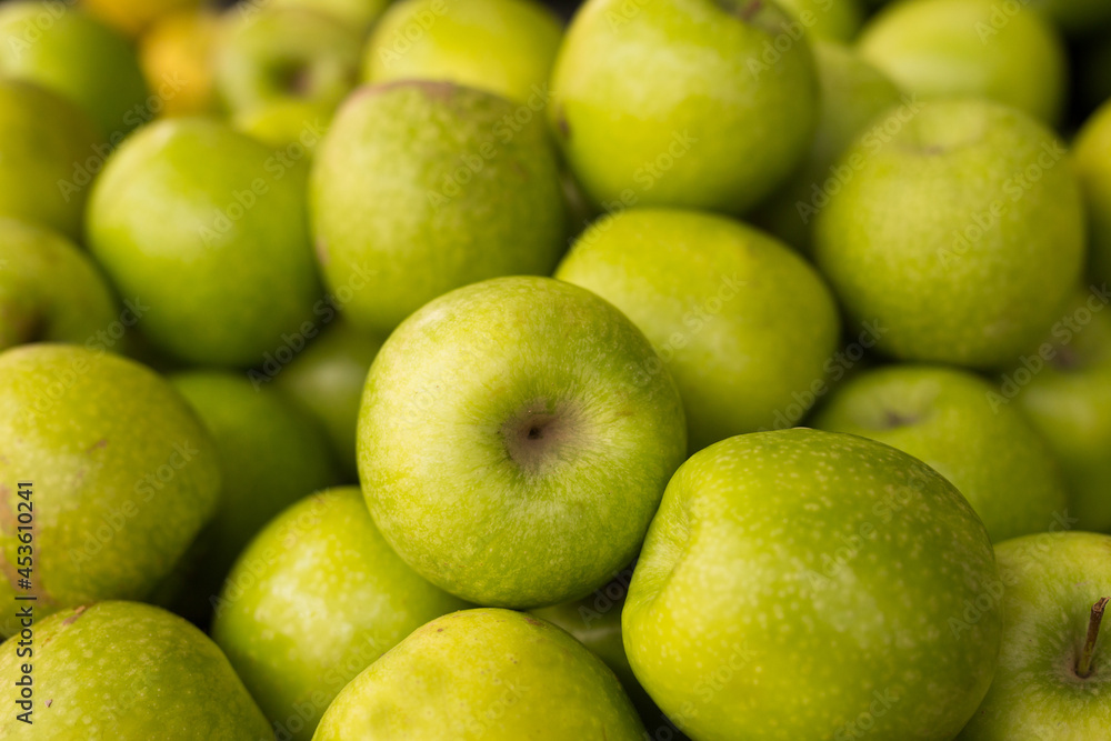 appetizing green apples on counter in market appetizing green apples on counter in market