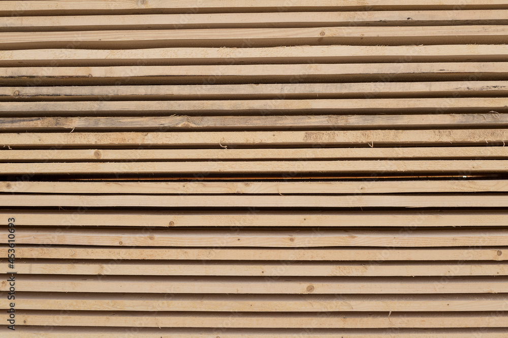 Close up of wooden timber flat plank wall pattern and background Close up of wooden timber flat plank wall pattern and background