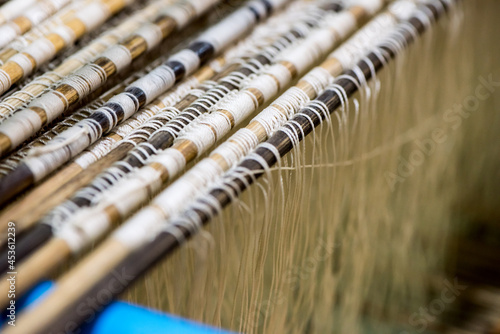 Weaving machine cotton fabric on natural background.