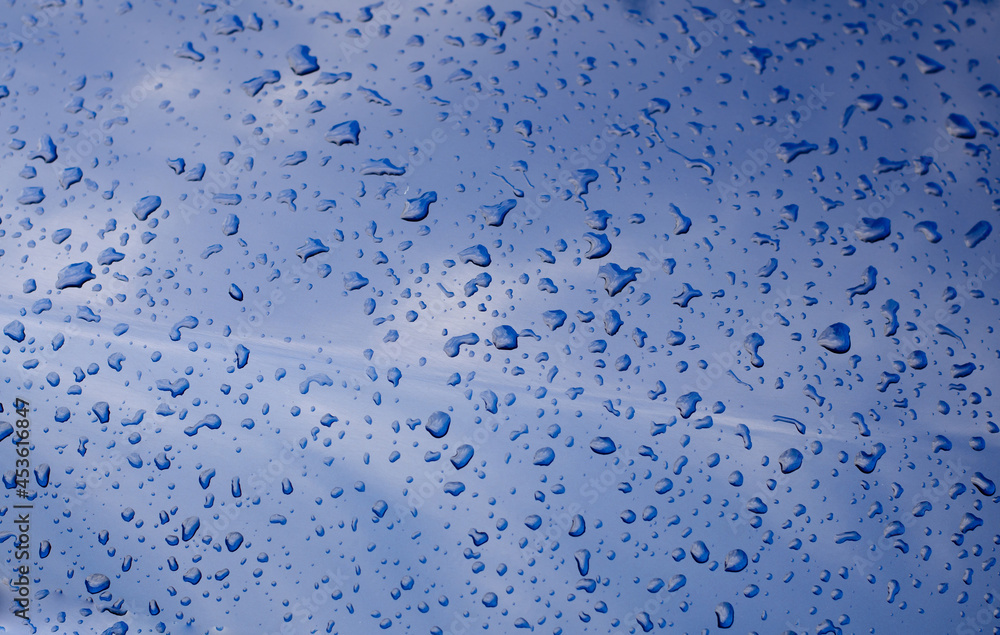 Raindrops on the surface. Wet surface. Dew drops. Raindrops on the surface. Wet surface. Dew drops.