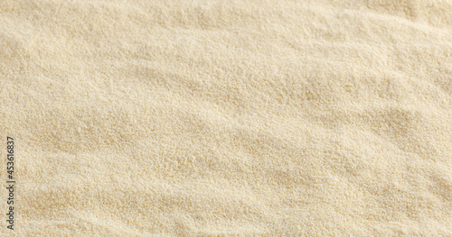 Uncooked semolina flour background