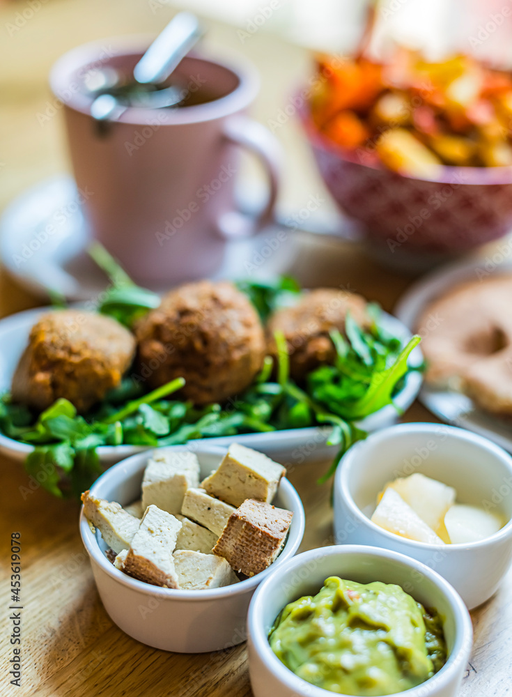 Vegan food served on a restaurant table Vegan food served on a restaurant table