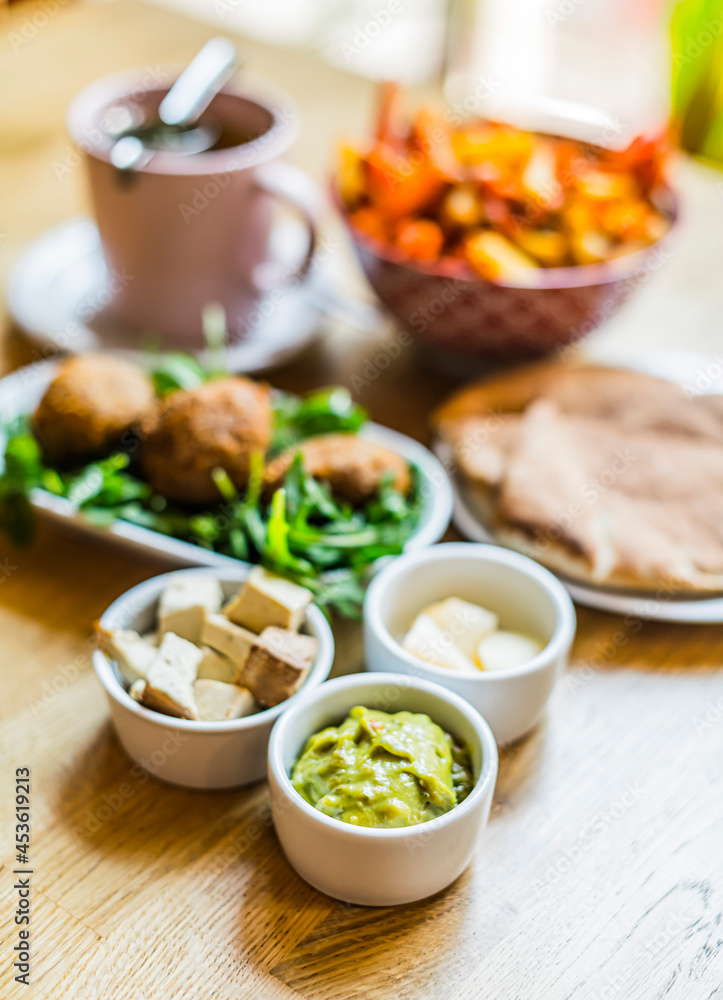 Vegan food served on a restaurant table Vegan food served on a restaurant table