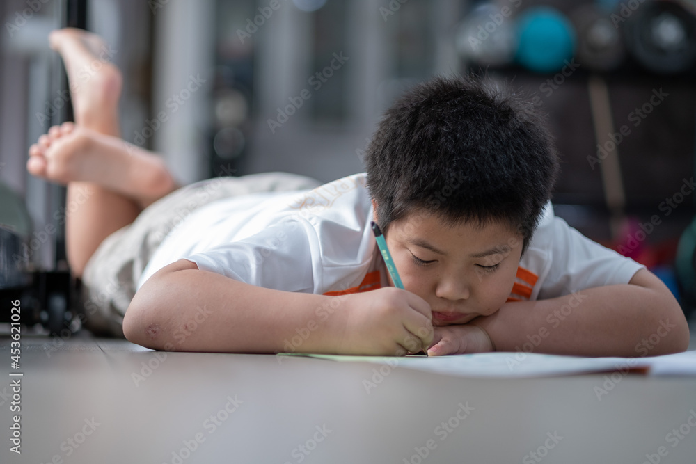 boy doing homework, child writing paper, education concept, back to school boy doing homework, child writing paper, education concept, back to school