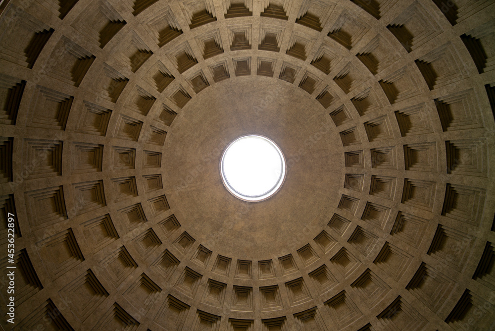The roof of the Pantheon in rome with the light coming through the 