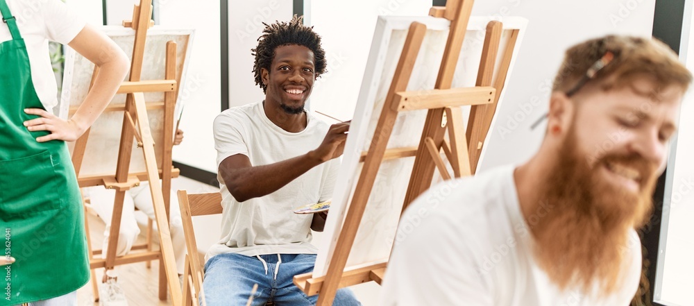 Group of people smiling happy drawing at art studio. Group of people smiling happy drawing at art studio.