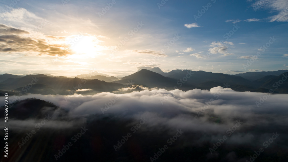 Beautiful sunshine at misty morning mountains at north thailand


