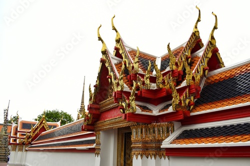 Gable apex on roof of the entrance arch in Wat Pho also spelled Wat Po, is a Buddhist temple in Bangkok, Thailand.