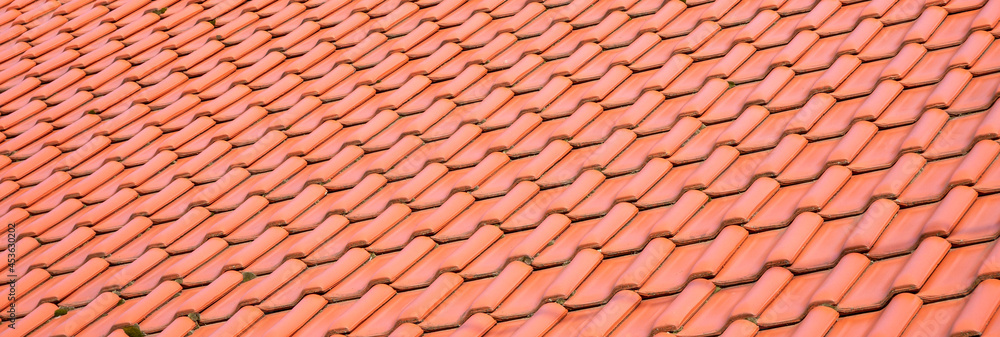Light orange classic roof tiles, new roof covering, traditional roofing service concept. Simple wide clean banner, roof surface material abstract background texture, backdrop, object closeup, nobody Light orange classic roof tiles, new roof covering, traditional roofing service concept. Simple wide clean banner, roof surface material abstract background texture, backdrop, object closeup, nobody