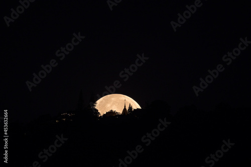 Moonset on the pagoda at Wat Phrathat Doi Suthep
