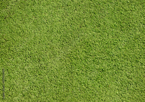 Artificial lawn, green grass field pitch surface background texture, top view high resolution fake grass floor backdrop, shot from above. Sports soccer football stadium pitch outdoors, turf, nobody