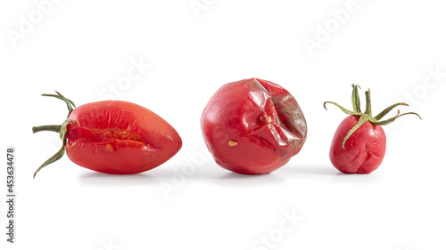 Spoiled tomatoes. Rotten Tomato decomposition isolated. Mouldy Tomato on white photo