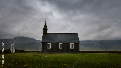 Atmospheric view of Black church Búðir, Iceland