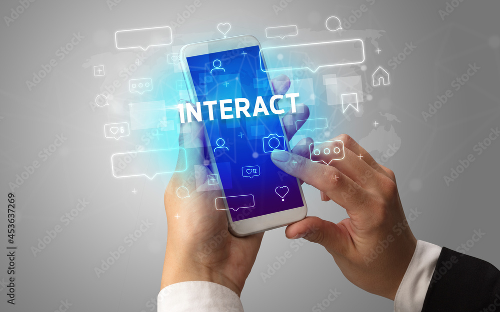 Hand using smartphone with social media concept