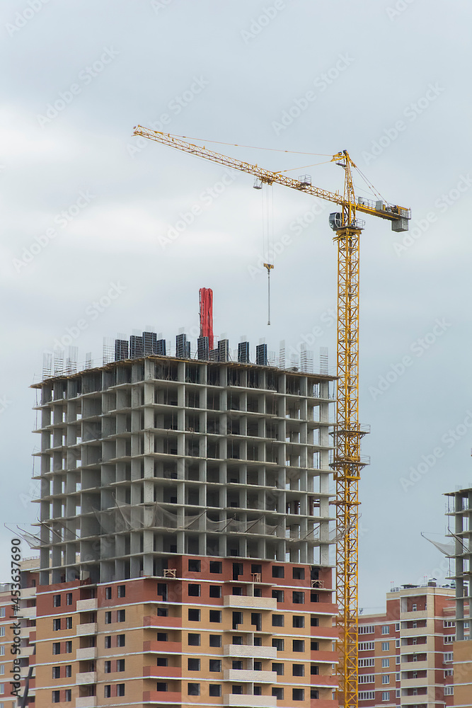 construction of a residential multi-storey building using a tower crane
