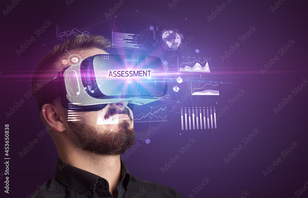 Businessman looking through Virtual Reality glasses Businessman looking through Virtual Reality glasses