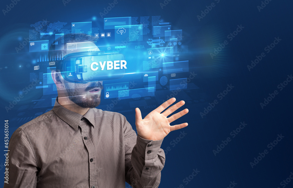 Businessman looking through Virtual Reality glasses Businessman looking through Virtual Reality glasses