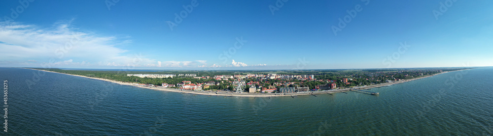 Baltic sea coastline with Zelenogradsk embankment for promenade. Kaliningrad region. Aerial panorama