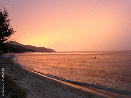 Beautiful colorful sunset at greek beach