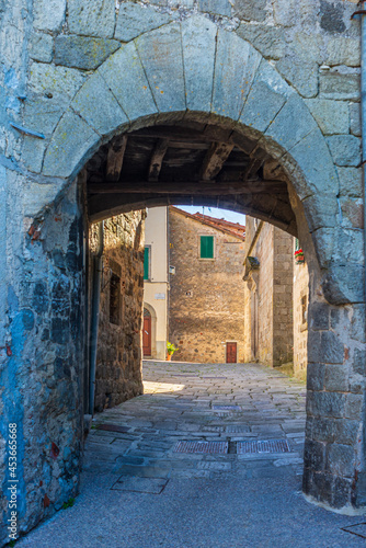 Italian medieval village details, historical stone arch, ancient gate, old city stone buildings architecture. Santa Fiora, Tuscany, Italy. © fabio lamanna
