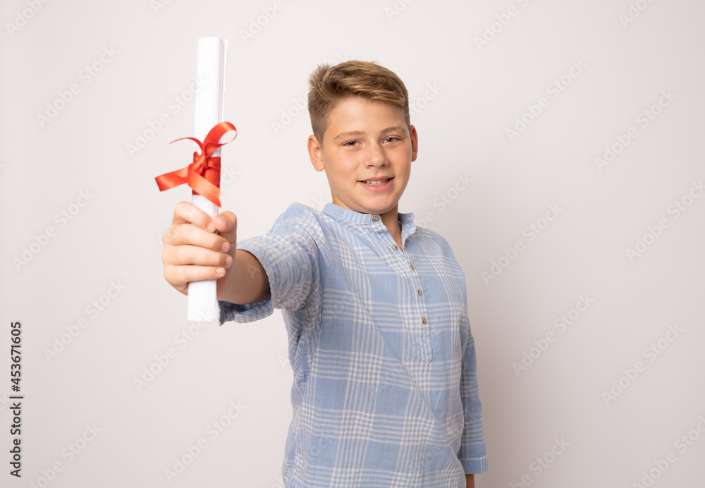 Male student with a diploma isolated on white background Male student with a diploma isolated on white background
