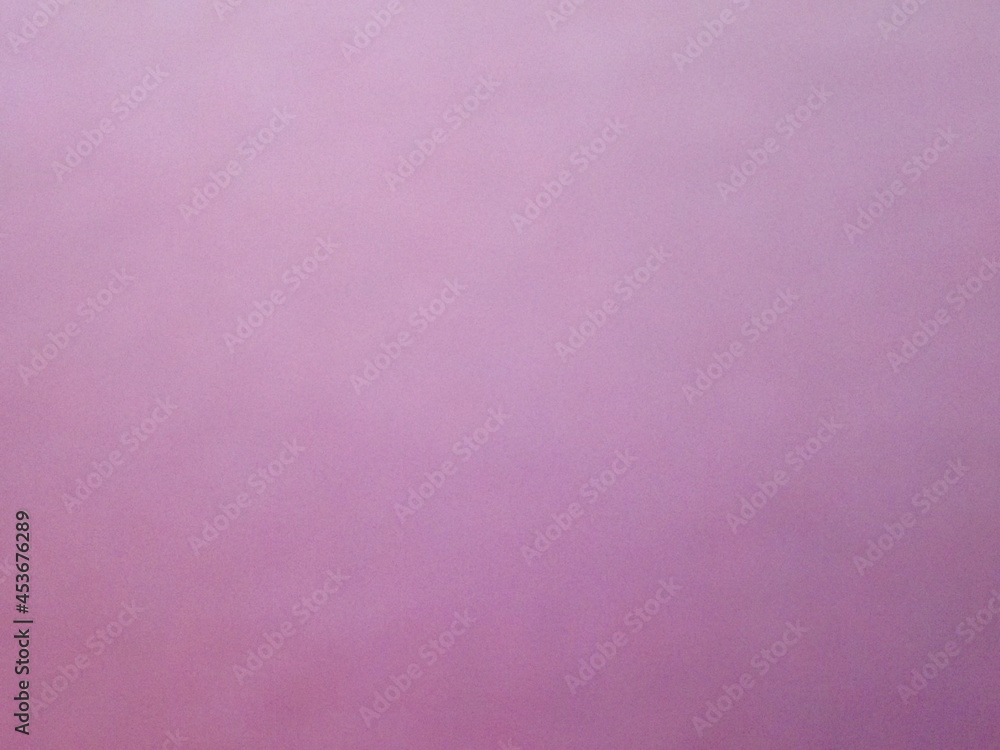 Purple solid color surface of colored paper as a background. High quality photo