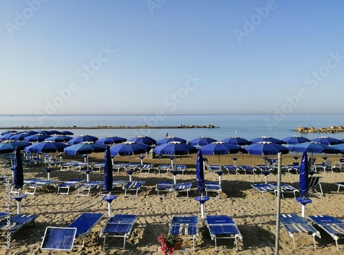 Beach in Italy with sunbeds and Umbrellas © Simon Mouton