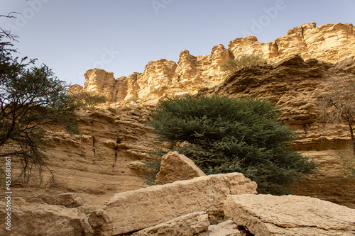 A rock cliff in the Sha'ib Luha valley south of Riyadh, Saudi Arabia photo